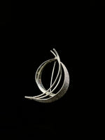 Sculptural brooch