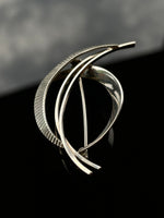 Sculptural brooch