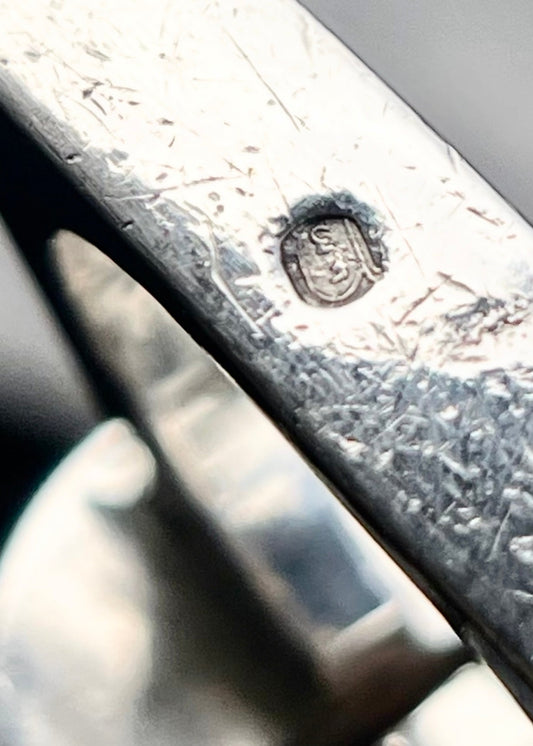 Trapeze ring with split azurite face