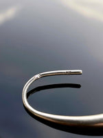 Minimalist curved earrings