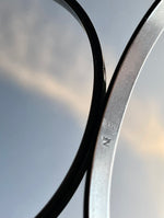 Irridescent silver bangle mechanical watch