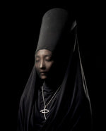 Sculptural necklace with white cabochon