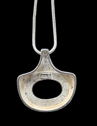 Sculptural onyx pendant
